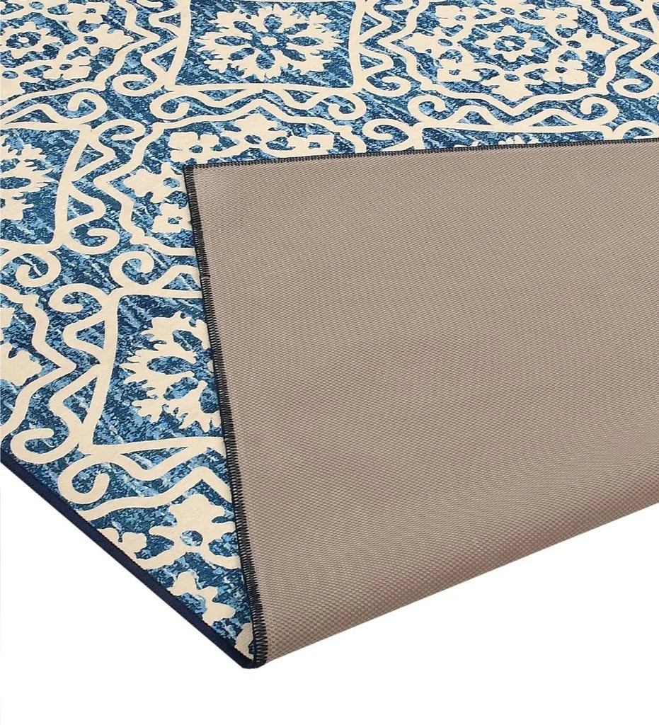 Machine washable Moroccan inspired blue rug.