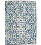 Blue Moroccan style rug with intricate geometric and floral patterns in navy and cream