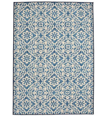 Blue Moroccan style rug with geometric floral pattern on cream background