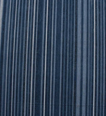 Coastal style rug featuring blue stripe pattern.