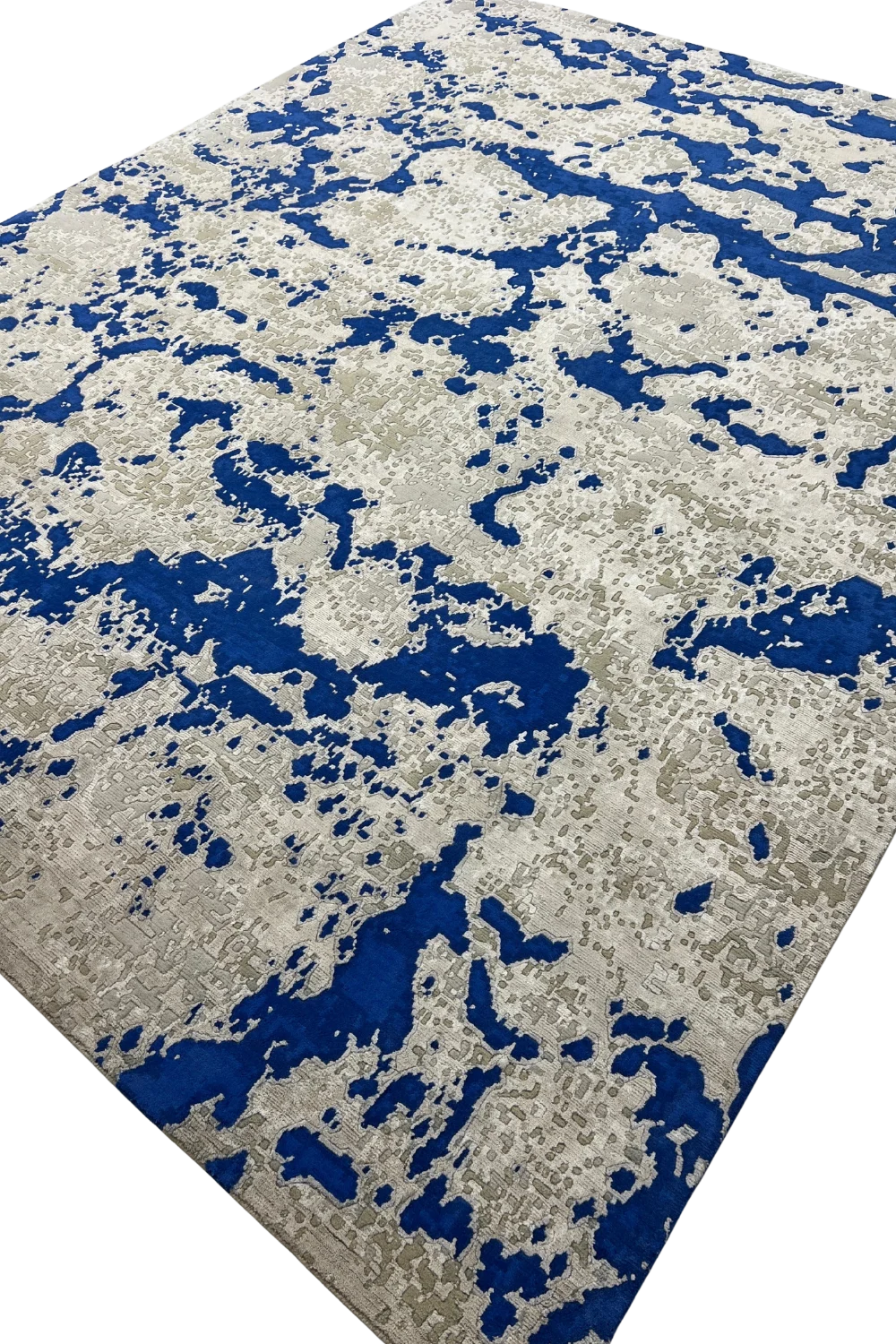 Abstract handwoven wool rug in blue and grey-beige tones.