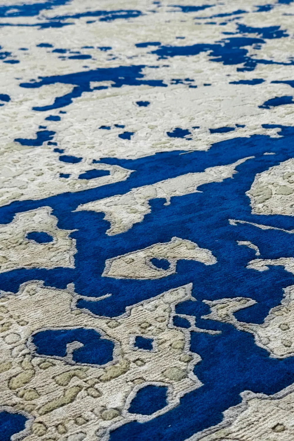 Blue and beige hand-knotted abstract rug for living and dining rooms.