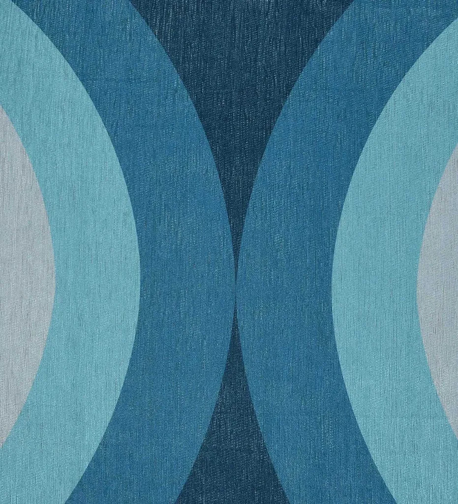 Bold arch motif rug in blue, coral, and cream tones.