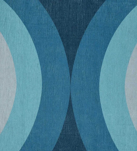 Bold arch motif rug in blue, coral, and cream tones.