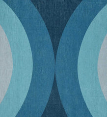 Bold arch motif rug in blue, coral, and cream tones.