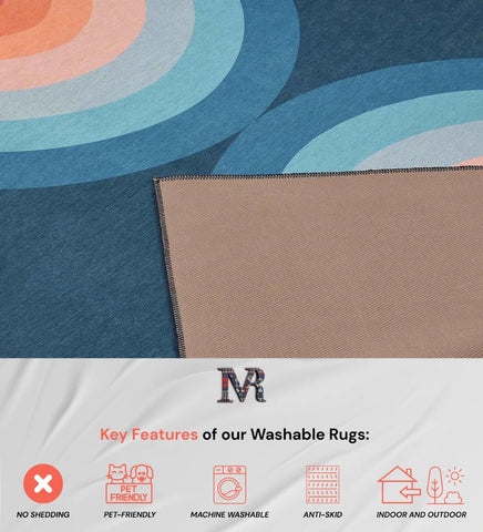Low-profile geometric rug with vibrant blue and coral design.
