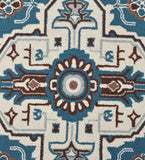 Blue and ivory traditional geometric floral rug with intricate symmetrical design