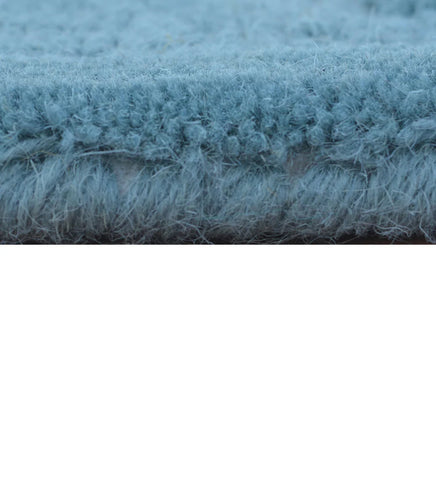 Pile Height of Blue Hand Tufted Rug