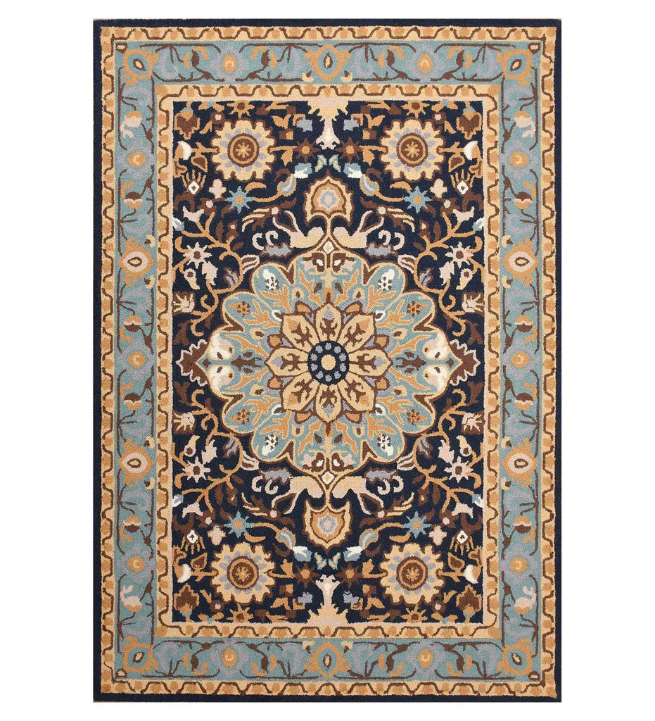 Hand-tufted blue and beige wool rug with traditional floral patterns in a classic style.