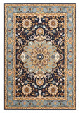 Traditional floral rug with blue and beige tones, intricate symmetrical pattern and decorative border