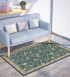 Luxury botanical area rug with detailed bird and leaf patterns under a modern light blue sofa in bright living room