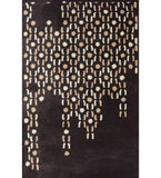 Brown hand-tufted wool rug with cascading beige and cream dot design