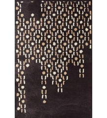Brown hand-tufted wool rug with cascading beige and cream dot design