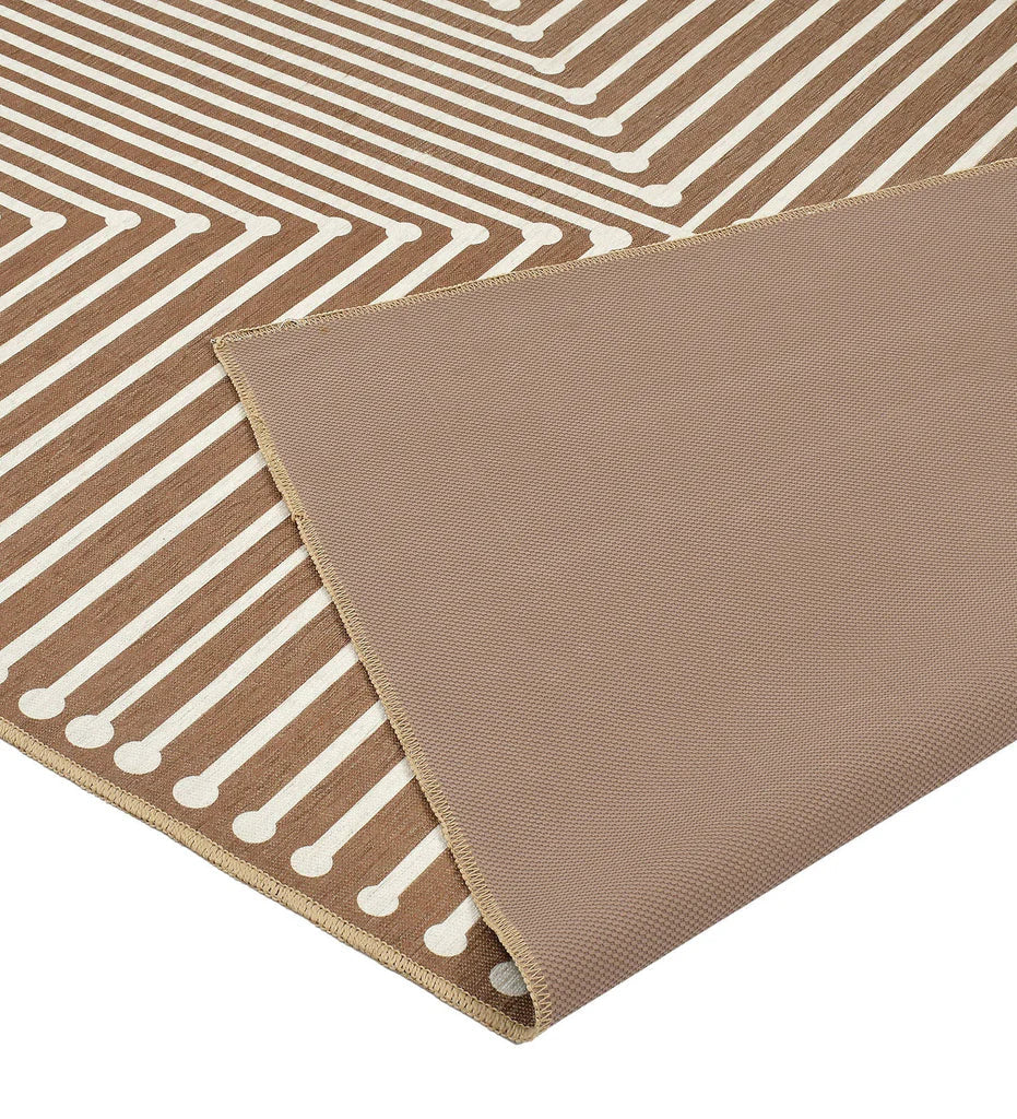 Durable geometric patterned rug for contemporary spaces.