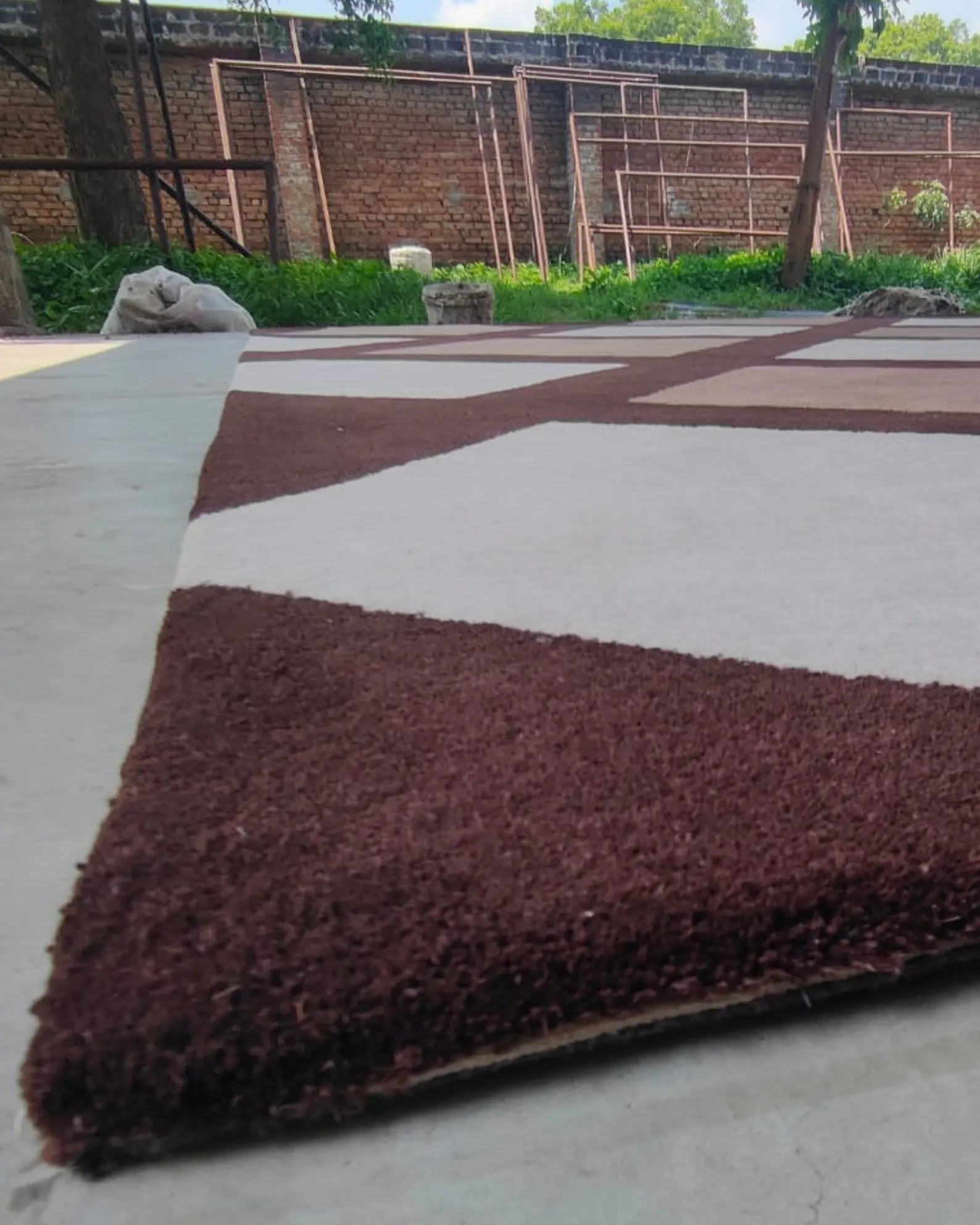 Beige and brown area rug ideal for modern or transitional interiors.