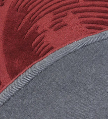 Premium wool rug in burgundy with textured floral patterns