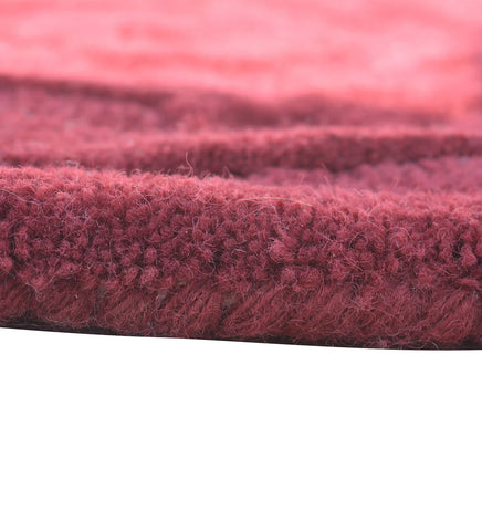 Heritage round rug with embossed design for formal interiors