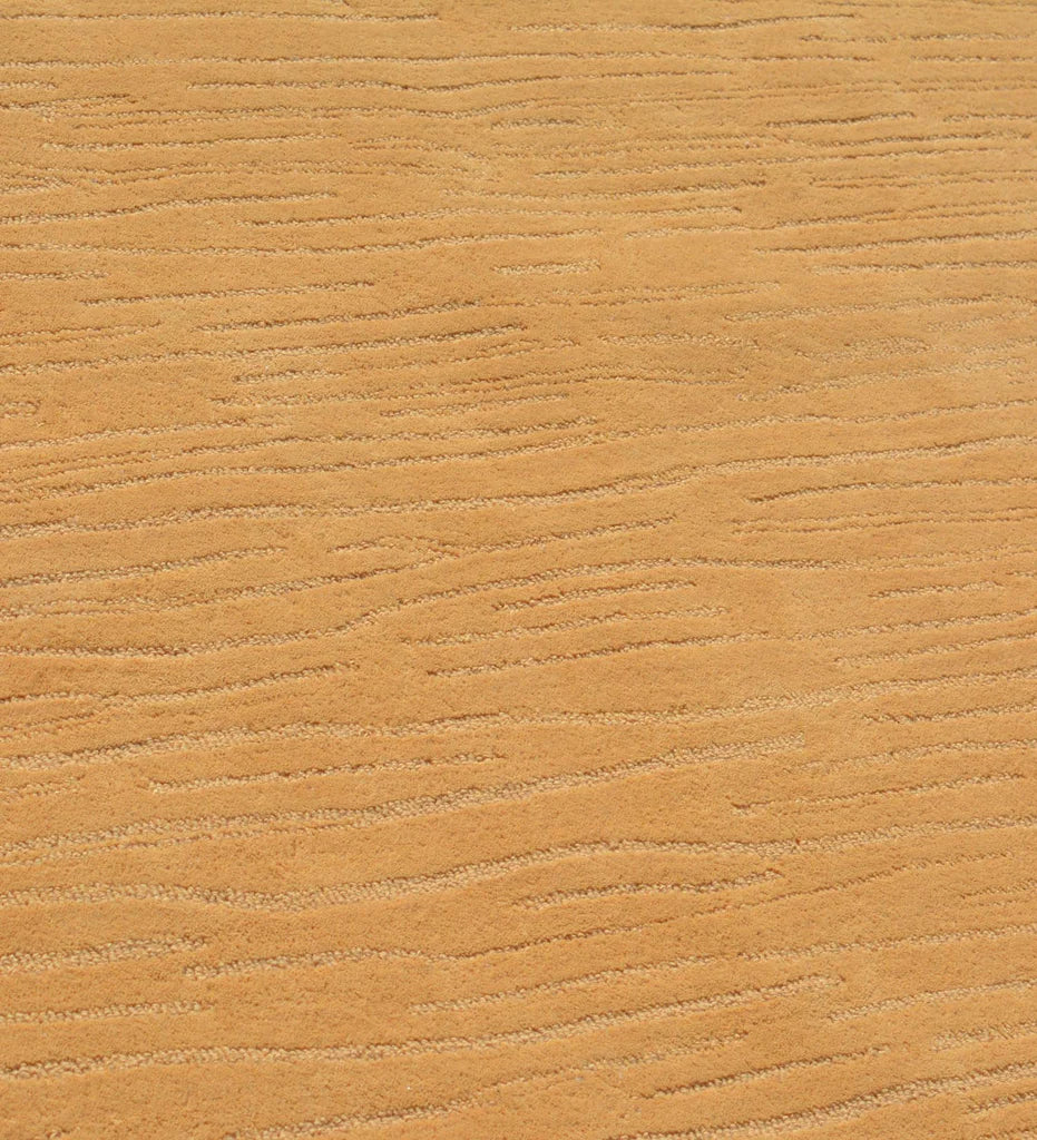 Luxury wool rug with vertical textured detailing in warm camel