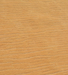 Luxury wool rug with vertical textured detailing in warm camel