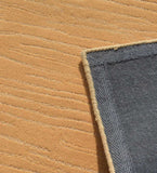 Contemporary camel wool rug with subtle line embossing