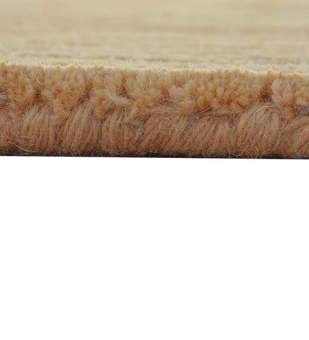 Hand-tufted rug with golden camel vertical stripe texture