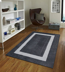 Modern bordered rug in grey and ivory with rectangular design