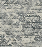 Charcoal modern rug with geometric zigzag pattern in shades of gray and white, handwoven luxury texture