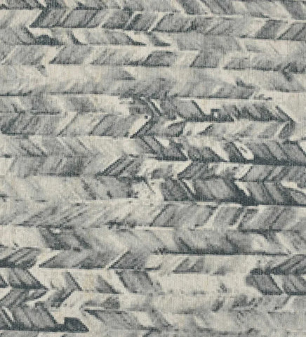 Low-profile modern rug in deep charcoal tones.