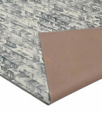 Luxury charcoal modern rug with geometric pattern and brown textured backing from Mannat Rugs