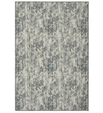 Modern charcoal gray and white patterned luxury rug with chevron design