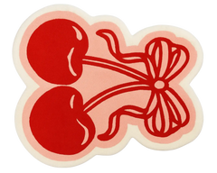 Luxury cherry bow rug featuring bold red cherries and pink background.