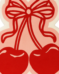 Modern pop art hand-tufted cherry rug for creative interiors.