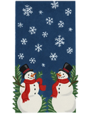 Hand-tufted Christmas rug runner with snowman design on blue base background.