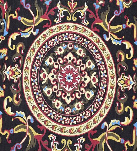 Low-profile burgundy rug with cream and gold detailing.