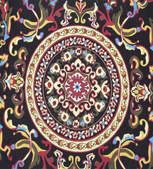 Low-profile burgundy rug with cream and gold detailing.
