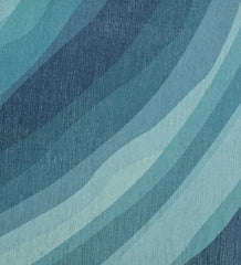 Abstract coastal rug with turquoise and beach-inspired tones.