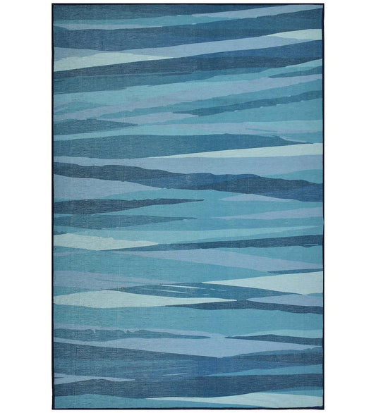 Coastal blue modern abstract rug with ocean-inspired design.