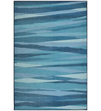 Coastal blue abstract modern rug with layered wavy stripes in various shades of blue