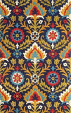 Colorful boho rug with floral and geometric patterns in red, blue, yellow, and white on a dark background