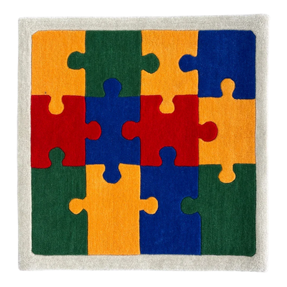 Colorful puzzle piece rug with red, orange, green, and blue pieces on a neutral background