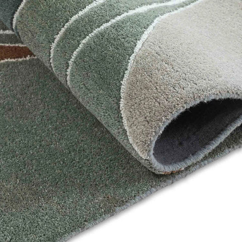 Luxury Hand-Tufted Wool Rug with Contemporary Artistic Pattern.