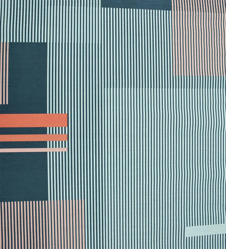Durable geometric rug with primary color accents.