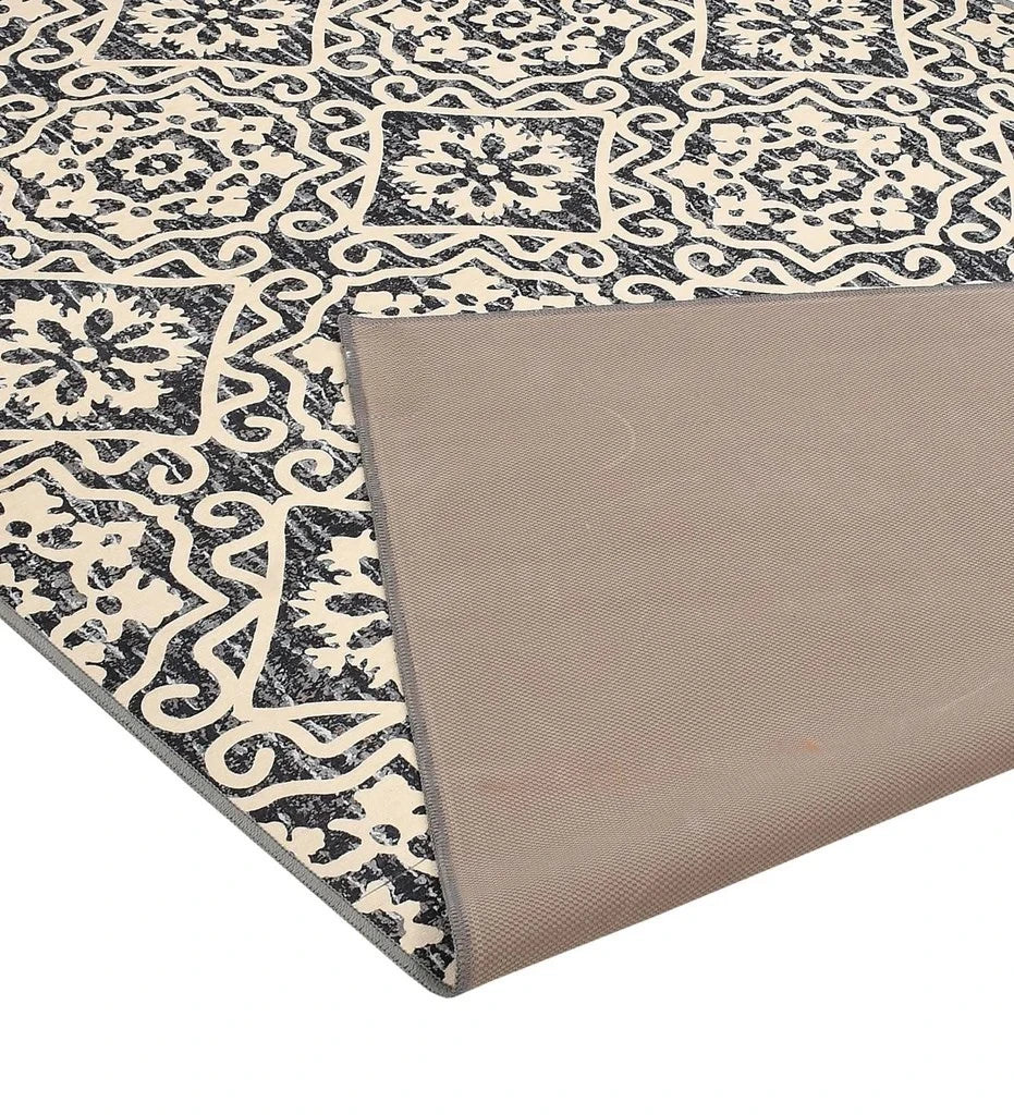 Durable cream and gray floral geometric area rug.