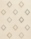 Hand-tufted wool rug in soft cream with subtle diamond texture.