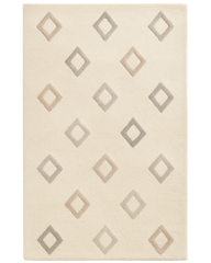 Cream hand-tufted wool diamond rug with minimalist geometric pattern.