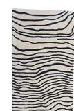Contemporary abstract area rug with black line art on cream background.
