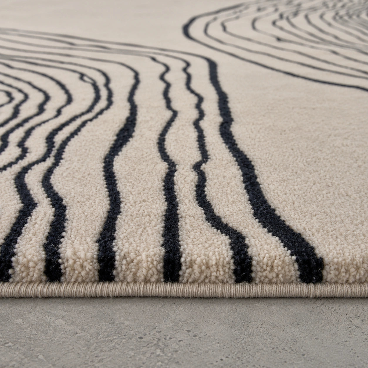 Cream black modern wool rug