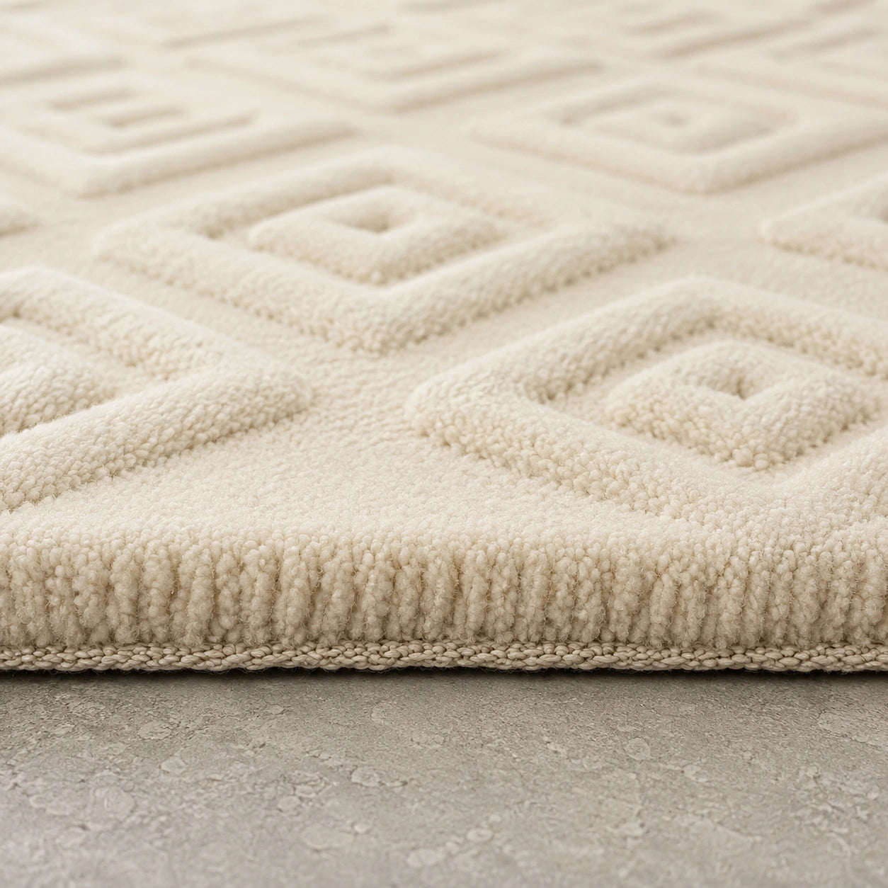 Cream textured sculpted wool rug