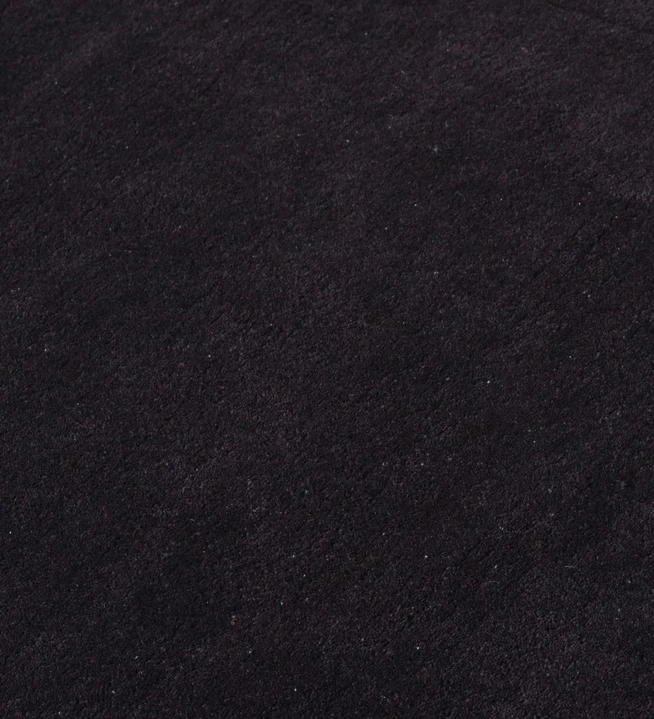 Luxury dark brown rug with subtle rectangular inset border