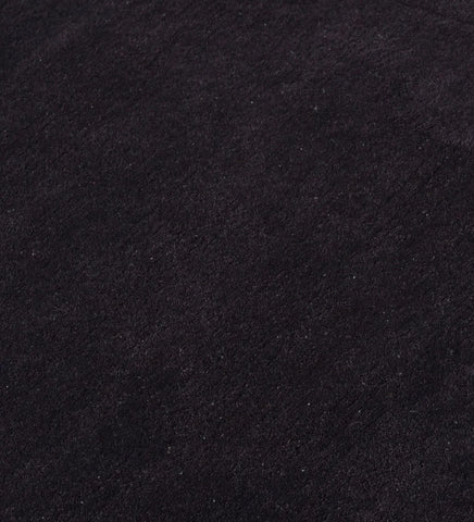 Luxury dark brown rug with subtle rectangular inset border